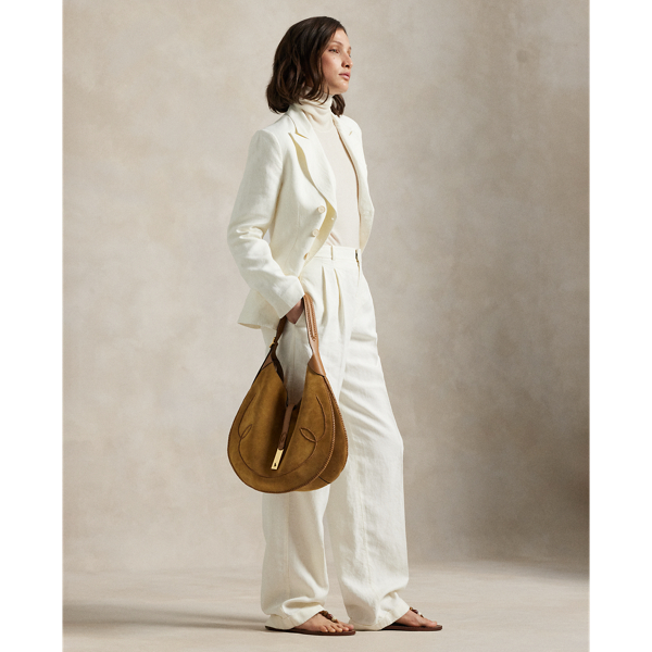 Capturing the timeless sophistication of classic tailored details, these wide-leg trousers are woven with lightweight hemp and feature knife pleats on the waist, folded cuffs and buttoned besom pocketing.
