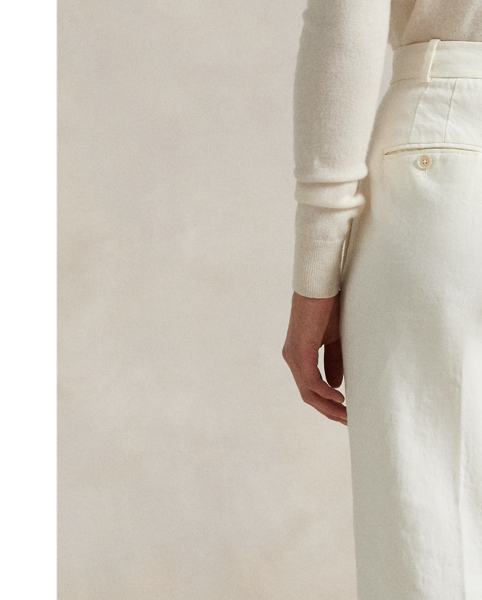 Capturing the timeless sophistication of classic tailored details, these wide-leg trousers are woven with lightweight hemp and feature knife pleats on the waist, folded cuffs and buttoned besom pocketing.