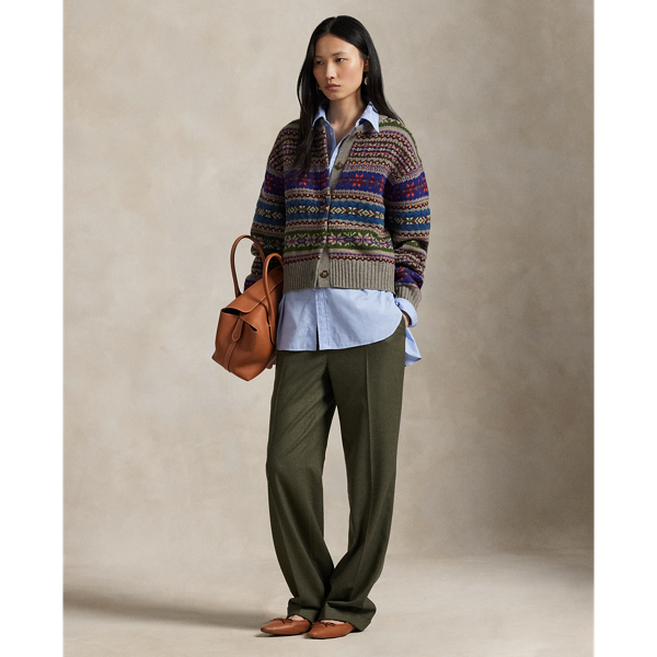 These wool twill trousers are cut for a relaxed, straight fit and have menswear-inspired details like an interior curtain waistband and crisp creases at the legs.