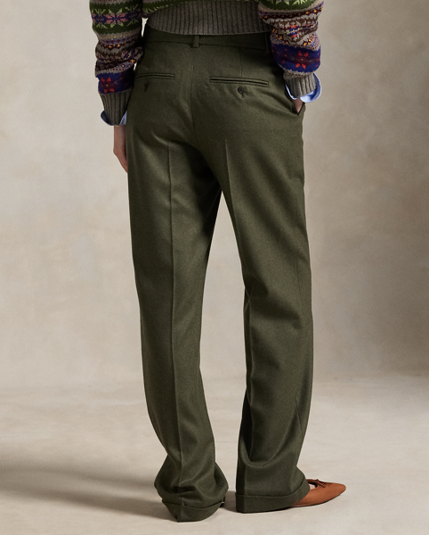 These wool twill trousers are cut for a relaxed, straight fit and have menswear-inspired details like an interior curtain waistband and crisp creases at the legs.