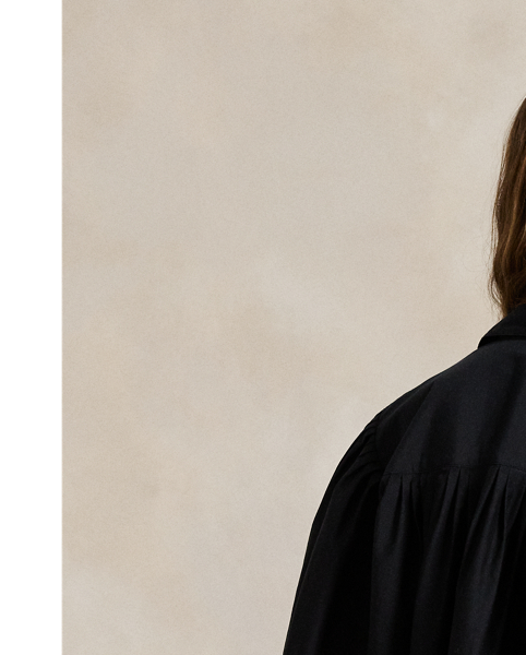 Soft pressed pleats detail this blouse, which is woven from a blend of cotton and silk to create its relaxed, flowing shape.