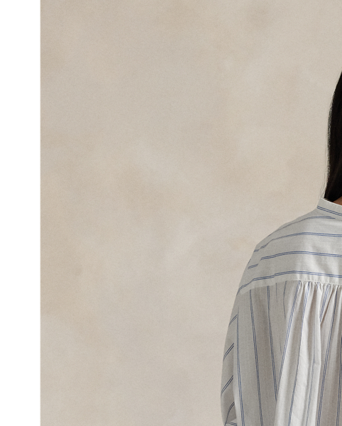 Cut from lightweight cotton dobby, this top is designed for a loose, oversize silhouette with yarn-dyed vertical stripes and a buttoned half-placket.