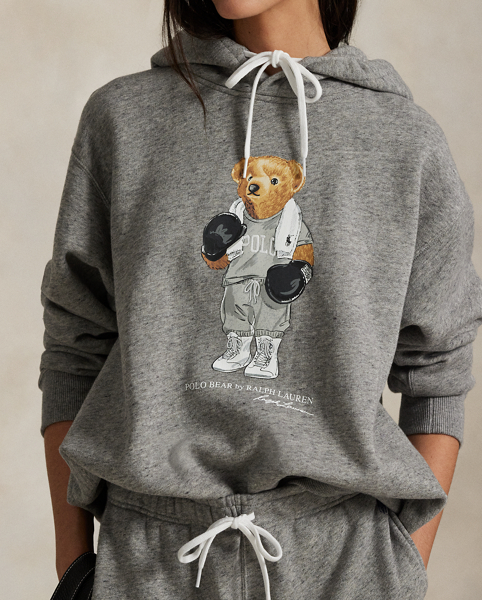 Ralph Lauren Lauren's Polo Bear takes centre stage on this fleece hoodie with a boxer-inspired look. The rubber-printed graphic is adorned with embroidered details for a touch of texture and dimension.