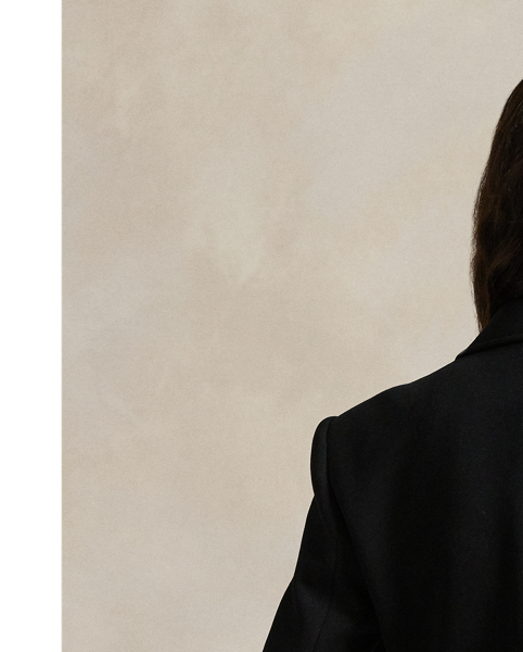 Woven with a cotton blend, this double-knit blazer is cut for a soft yet structured silhouette and finished with notch lapels.