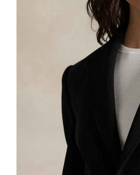 Woven with a cotton blend, this double-knit blazer is cut for a soft yet structured silhouette and finished with notch lapels.