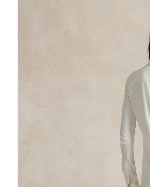 Crafted from medium-weight ponte fabric with a touch of stretch, this shirtdress is cut for an elongated maxi silhouette with a spread collar and full buttoned placket.