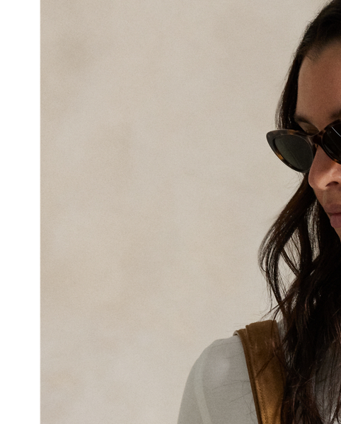 Crafted from medium-weight ponte fabric with a touch of stretch, this shirtdress is cut for an elongated maxi silhouette with a spread collar and full buttoned placket.