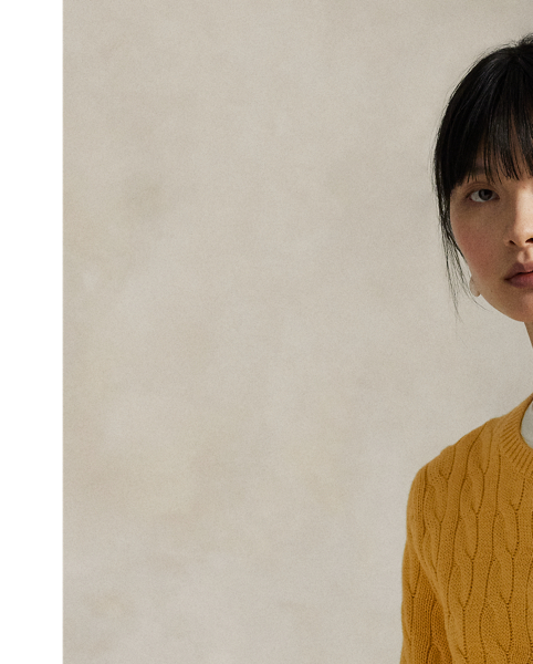 Cable-knit with pure cotton, this slim crewneck cardigan is finished with the signature embroidered Pony on the chest.