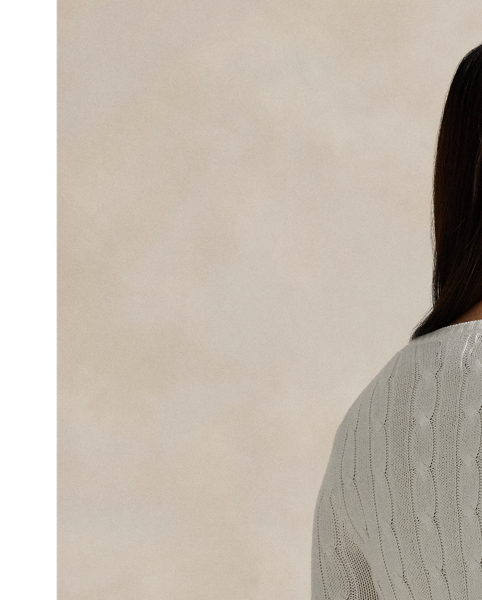 A Polo essential, this slim-fitting crewneck jumper is made with soft, combed cotton and showcases our signature cable-knit construction.