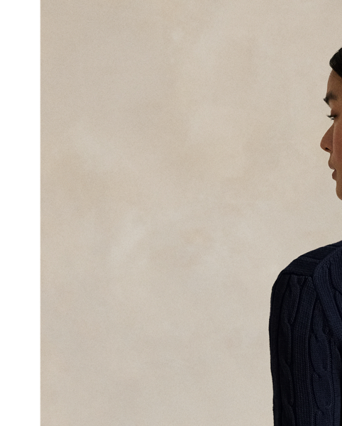 A Polo essential, this slim-fitting crewneck jumper is made with soft, combed cotton and showcases our signature cable-knit construction.