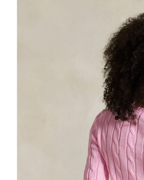 A Polo essential, this slim-fitting crewneck jumper is made with soft, combed cotton and showcases our signature cable-knit construction.