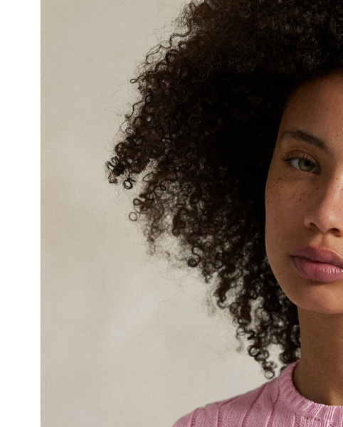 A Polo essential, this slim-fitting crewneck jumper is made with soft, combed cotton and showcases our signature cable-knit construction.