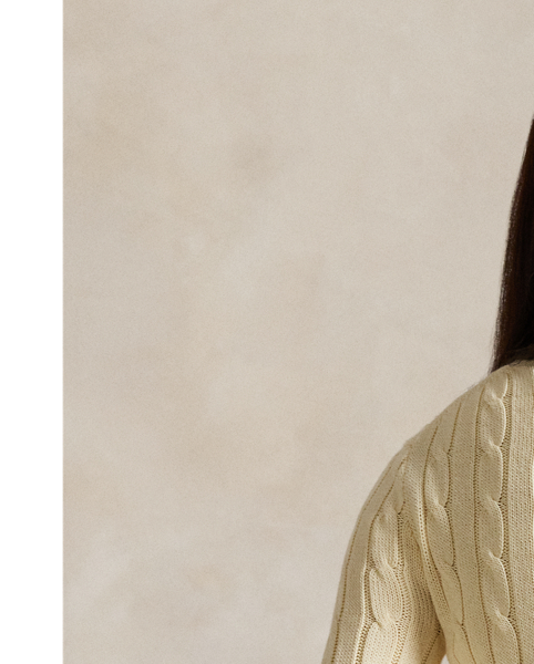 A Polo essential, this slim-fitting crewneck jumper is made with soft, combed cotton and showcases our signature cable-knit construction.