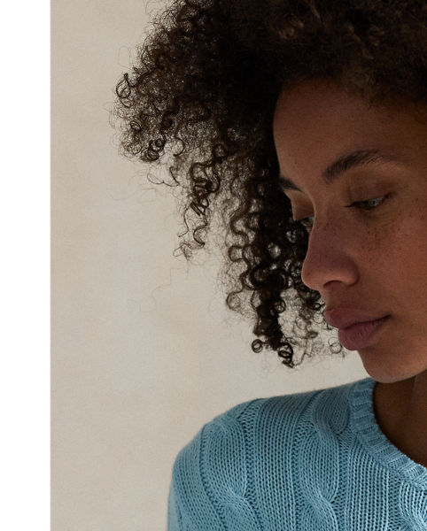 A Polo essential, this slim-fitting crewneck jumper is made with soft, combed cotton and showcases our signature cable-knit construction.