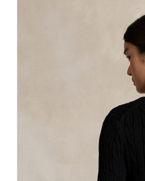 Crafted with combed cotton for a soft hand, this classic V-neck jumper is defined by a cable-knit construction and a slim-fitting silhouette. Our embroidered Pony on the chest lends a signature finish.