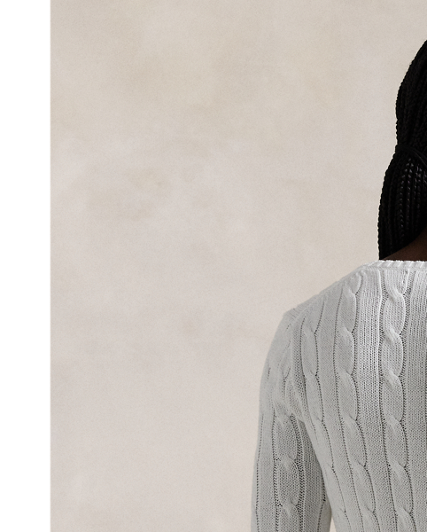 Crafted with combed cotton for a soft hand, this classic V-neck jumper is defined by a cable-knit construction and a slim-fitting silhouette. Our embroidered Pony on the chest lends a signature finish.
