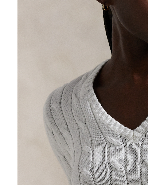 Crafted with combed cotton for a soft hand, this classic V-neck jumper is defined by a cable-knit construction and a slim-fitting silhouette. Our embroidered Pony on the chest lends a signature finish.
