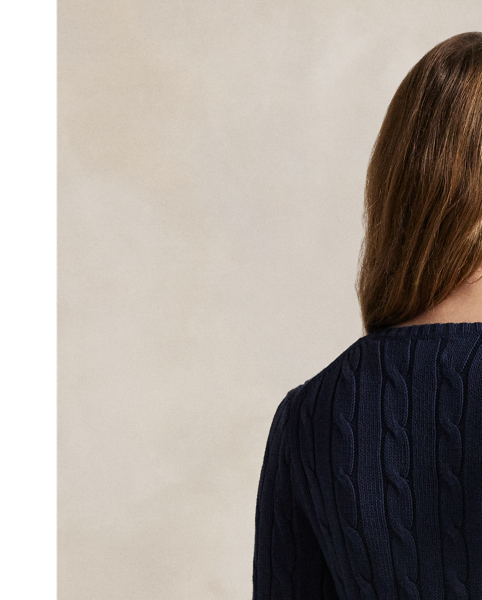 Crafted with combed cotton for a soft hand, this classic V-neck jumper is defined by a cable-knit construction and a slim-fitting silhouette. Our embroidered Pony on the chest lends a signature finish.