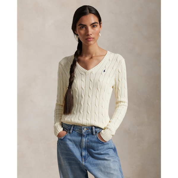 Crafted with combed cotton for a soft hand, this classic V-neck jumper is defined by a cable-knit construction and a slim-fitting silhouette. Our embroidered Pony on the chest lends a signature finish.