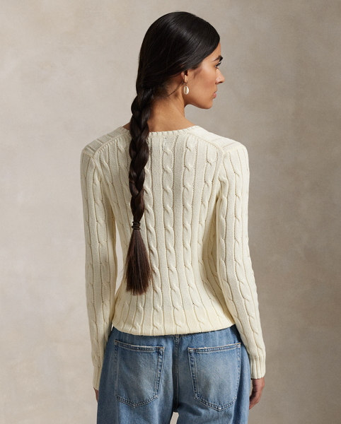 Crafted with combed cotton for a soft hand, this classic V-neck jumper is defined by a cable-knit construction and a slim-fitting silhouette. Our embroidered Pony on the chest lends a signature finish.
