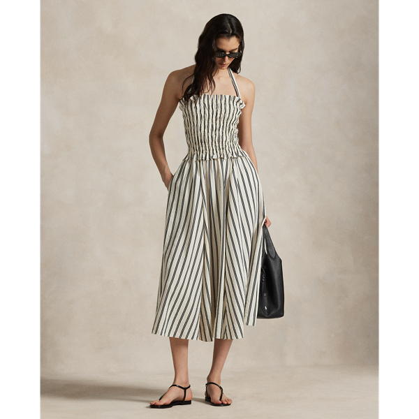 Crafted from a silk blend for an airy, crinkled hand, this striped dress pairs a smocked bodice and a flowing A-line skirt. The slender shoulder straps can be adjusted or removed for customised versatility.