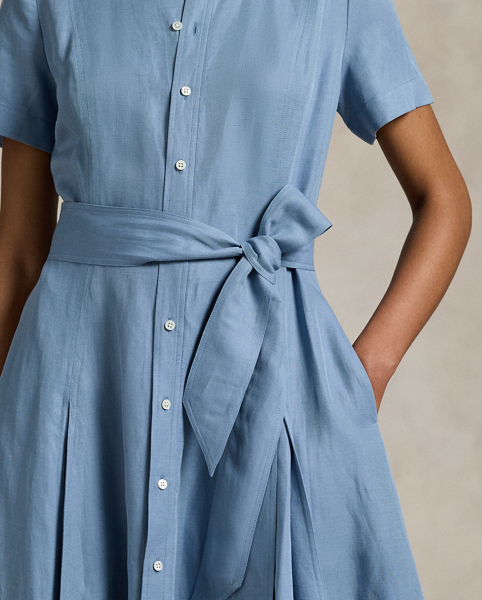 Blending silk, linen and cotton yarns to create a soft drape and gentle structure, this version of Polo's timeless shirtdress is designed for a sweeping A-line silhouette with inverted box pleats at the skirt for added volume.