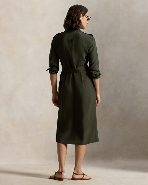 Smooth faille fabric brings an effortless drape to the structured lines of this belted shirtdress, which features utility-inspired details, including patch pocketing and buttoned shoulder epaulets.