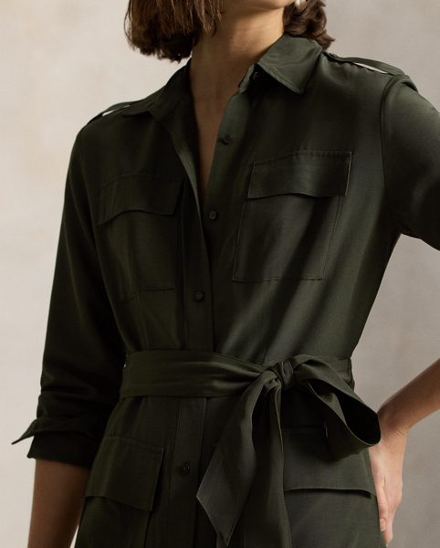 Smooth faille fabric brings an effortless drape to the structured lines of this belted shirtdress, which features utility-inspired details, including patch pocketing and buttoned shoulder epaulets.