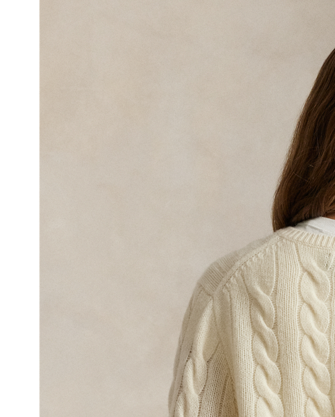 Cable-knit with a soft blend of Italian wool and carded cashmere, this buttoned crewneck cardigan is accented with our signature embroidered Pony at the chest.