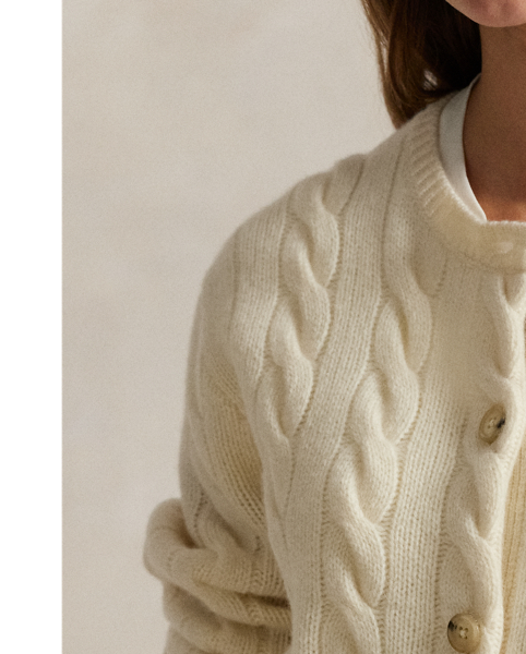 Cable-knit with a soft blend of Italian wool and carded cashmere, this buttoned crewneck cardigan is accented with our signature embroidered Pony at the chest.