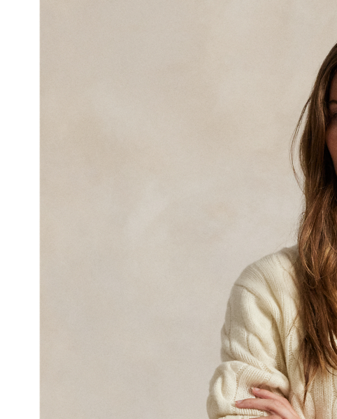 Cable-knit with a soft blend of Italian wool and carded cashmere, this buttoned crewneck cardigan is accented with our signature embroidered Pony at the chest.