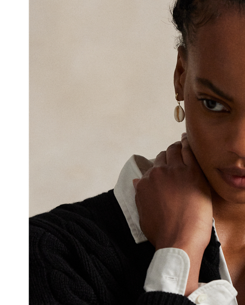 Cable-knit with a soft blend of Italian wool and carded cashmere, this buttoned crewneck cardigan is accented with our signature embroidered Pony at the chest.