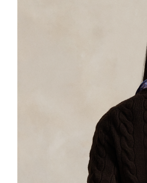 Cable-knit with a soft blend of Italian wool and carded cashmere, this buttoned crewneck cardigan is accented with our signature embroidered Pony at the chest.