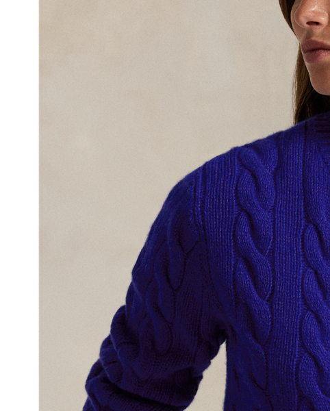 Cable-knit with a soft blend of Italian wool and carded cashmere, this buttoned crewneck cardigan is accented with our signature embroidered Pony at the chest.