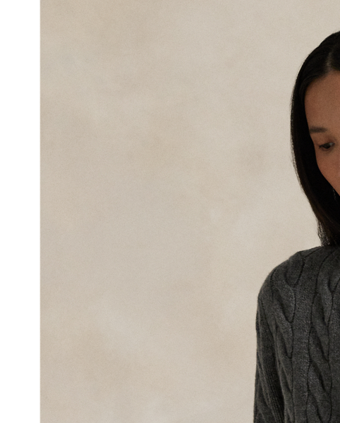 Cable-knit with a soft blend of Italian wool and carded cashmere, this buttoned crewneck cardigan is accented with our signature embroidered Pony at the chest.