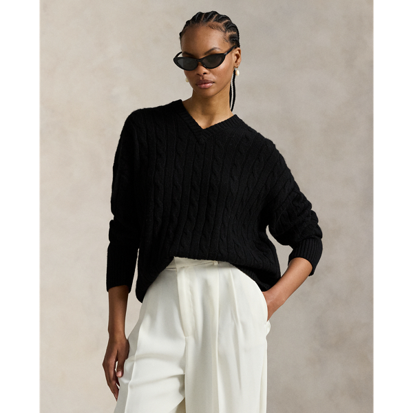 This V-neck jumper is cable-knit with soft Italian cashmere for a relaxed silhouette that features dropped shoulders and rib-knit edges.