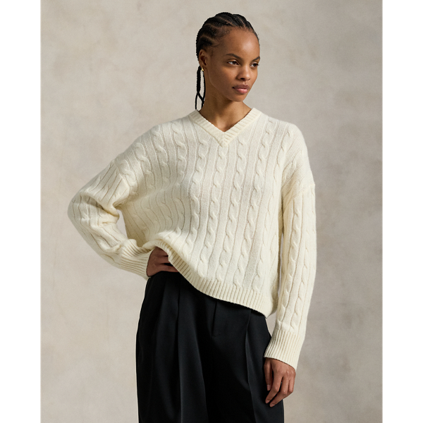 This V-neck jumper is cable-knit with soft Italian cashmere for a relaxed silhouette that features dropped shoulders and rib-knit edges.