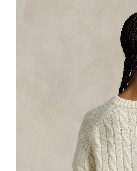 This V-neck jumper is cable-knit with soft Italian cashmere for a relaxed silhouette that features dropped shoulders and rib-knit edges.