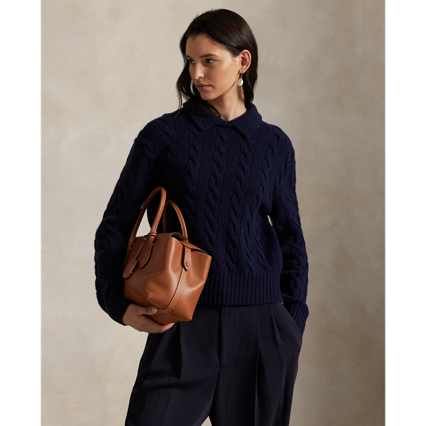 Cable-knit with a plush, heavyweight blend of Italian wool-and-cashmere yarn, this relaxed-fitting jumper gets a modern update with a layered Polo collar that stands when buttoned.