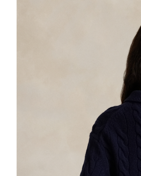 Cable-knit with a plush, heavyweight blend of Italian wool-and-cashmere yarn, this relaxed-fitting jumper gets a modern update with a layered Polo collar that stands when buttoned.