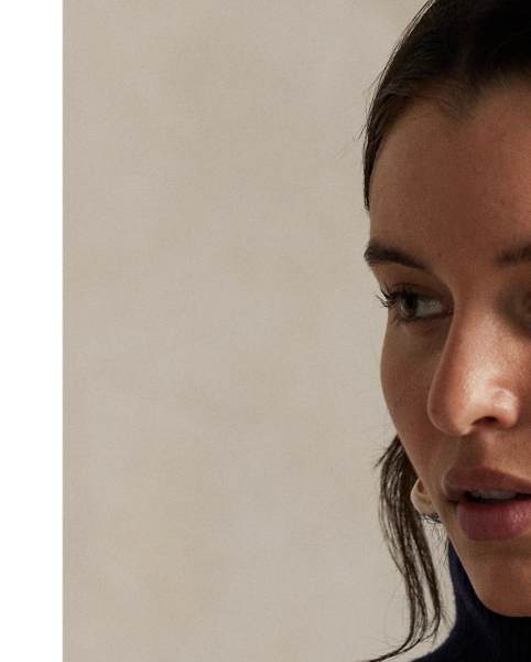 Cable-knit with a plush, heavyweight blend of Italian wool-and-cashmere yarn, this relaxed-fitting jumper gets a modern update with a layered Polo collar that stands when buttoned.