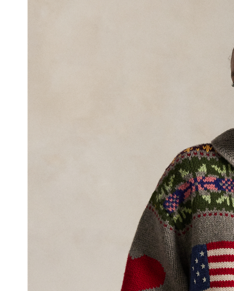 This wool cardigan is decorated with intarsia-knit motifs throughout, including Fair Isle-inspired patterns, the Polo Bear and signature  Ralph Lauren Lauren logos. The relaxed silhouette features an enveloping shawl collar and full-zip placket.