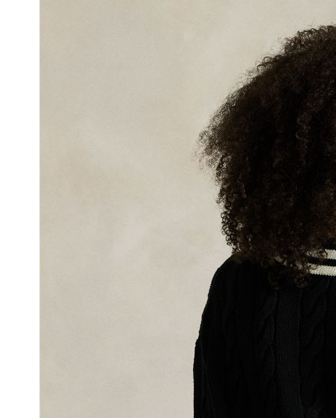 Inspired by the classic cricket jumper – an enduring Polo staple – this season's version is Aran-knit with cotton for soft texture and features contrast stripes at the neckline, cuffs and hem.