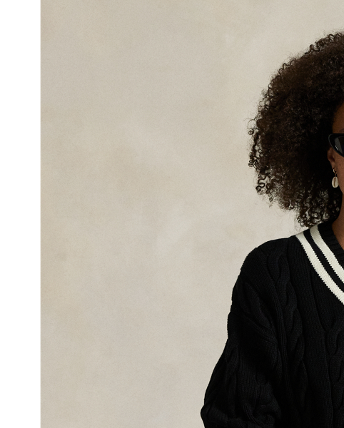 Inspired by the classic cricket jumper – an enduring Polo staple – this season's version is Aran-knit with cotton for soft texture and features contrast stripes at the neckline, cuffs and hem.