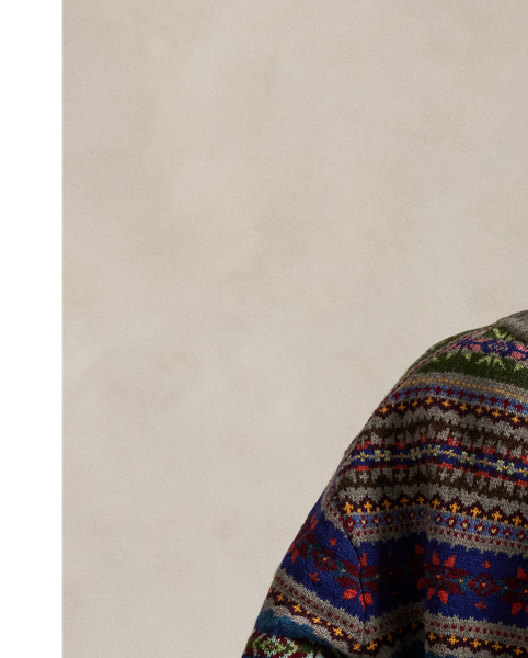 Jacquard-knit with a multicoloured Fair Isle-inspired motif, this buttoned cardigan is made from a blend of worsted wool and cotton yarns for a soft, refined surface.