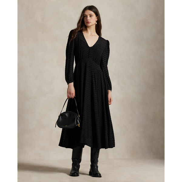 Sheer silk-blend crepe fabric features a tonal dot motif created with a fil coupé technique in this blouson dress. It's constructed with a deep V-neckline, button-and-loop front placket and removable slip for a layer of opacity.