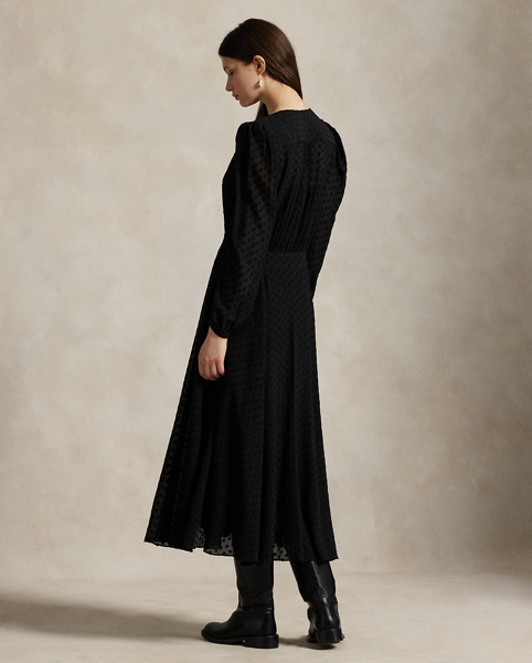 Sheer silk-blend crepe fabric features a tonal dot motif created with a fil coupé technique in this blouson dress. It's constructed with a deep V-neckline, button-and-loop front placket and removable slip for a layer of opacity.