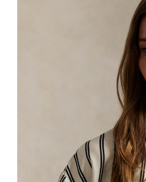 Crafted from a silk blend, this striped short-sleeve top features a clean-lined construction with a panelled back yoke and dropped shoulders.