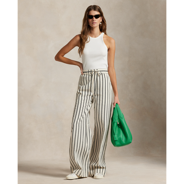 Crafted with a silk blend for an airy, crinkled hand, these trousers feature a clean-lined construction that combines a wide-leg silhouette with vertical stripes and a drawstring detail at the waist.