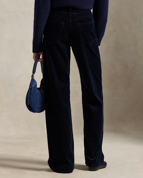 Rendered in wide-wale cotton corduroy, these trousers are cut for a wide-leg silhouette with a high-rise waist and subtle flare.